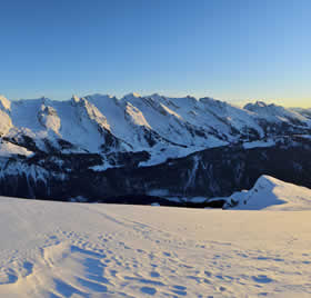 Snow-covered peaks and icy landscapes, offering a glimpse into winter adventure tours in the majestic mountains of Pakistan.